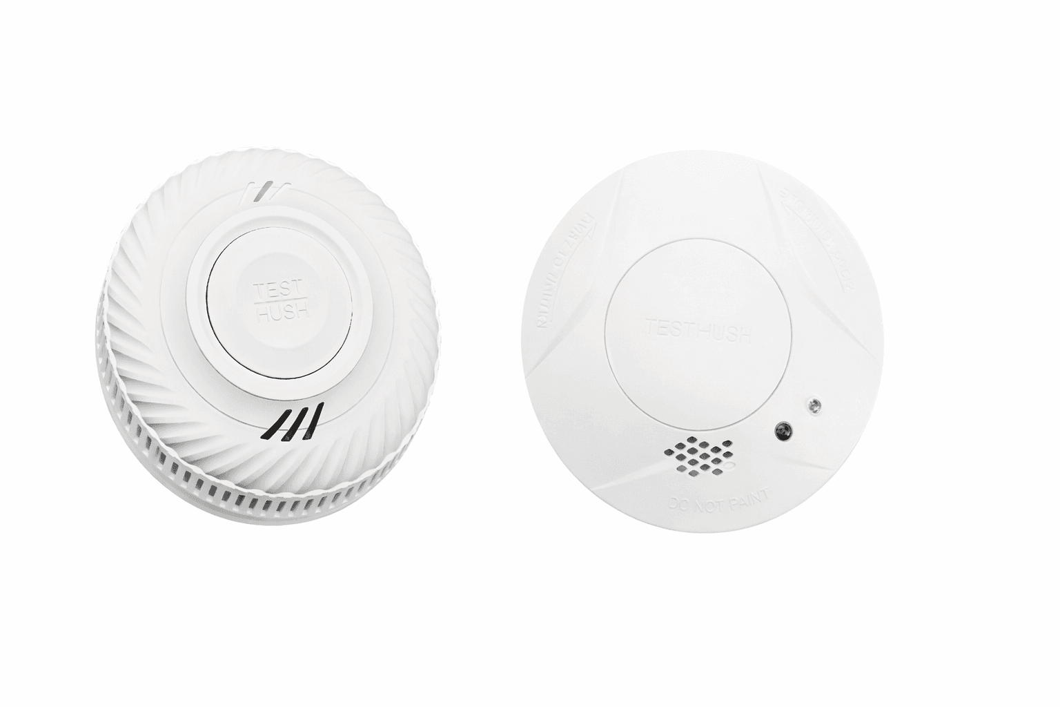 Two white smoke detectors labeled 'TEST HUSH' on a white background.