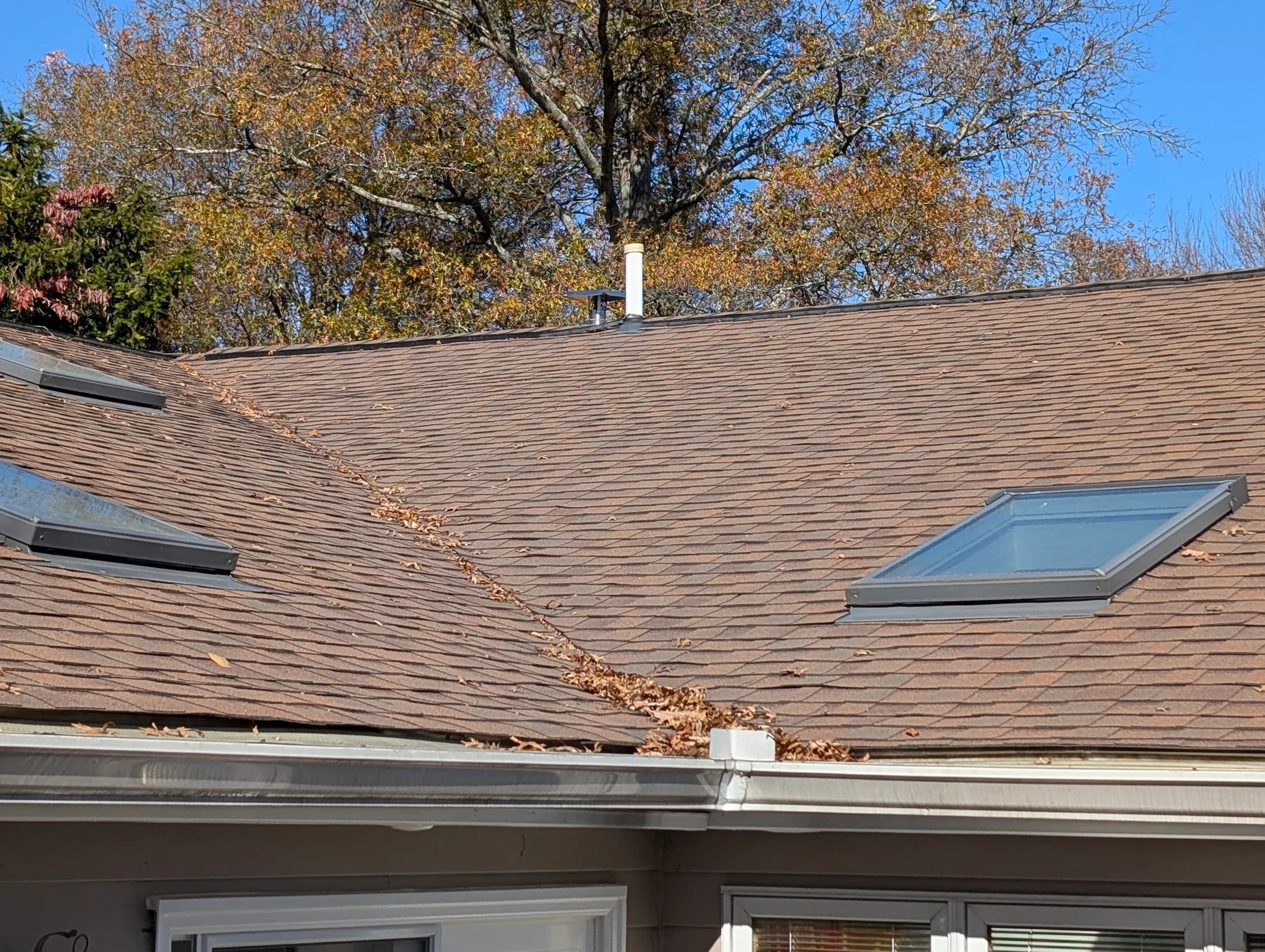 The Fall Roof Check From the Ground: Shingle, Flashing and Vent Signs Visible Without a Ladder